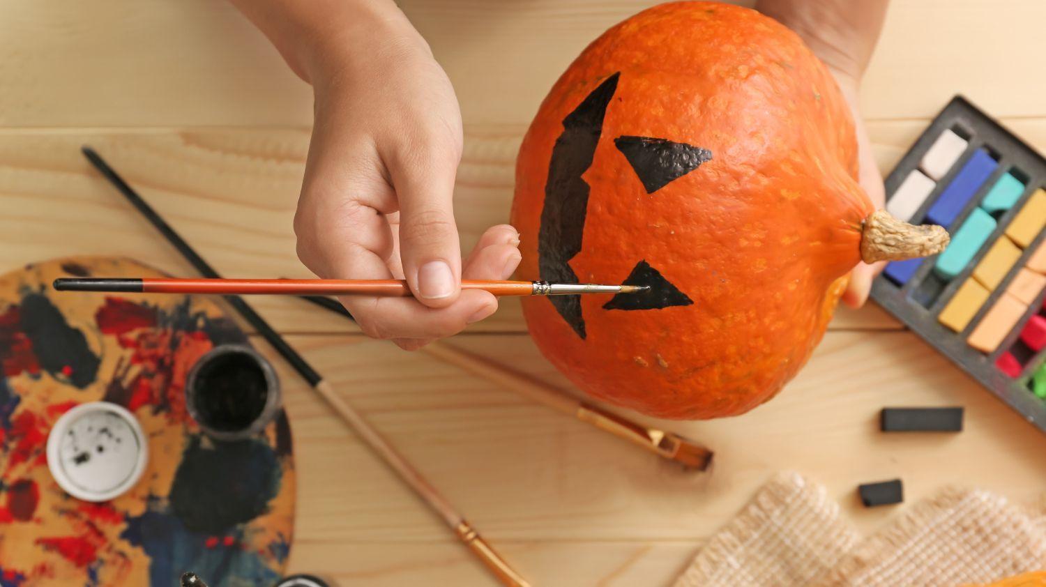 Pumpkin decorating event during Halloween at the Kids Club.